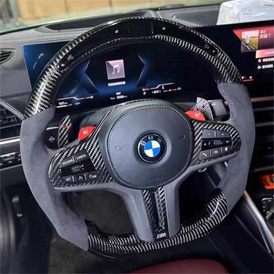 Carbon fiber steering wheel for BMW by Sveacarbon