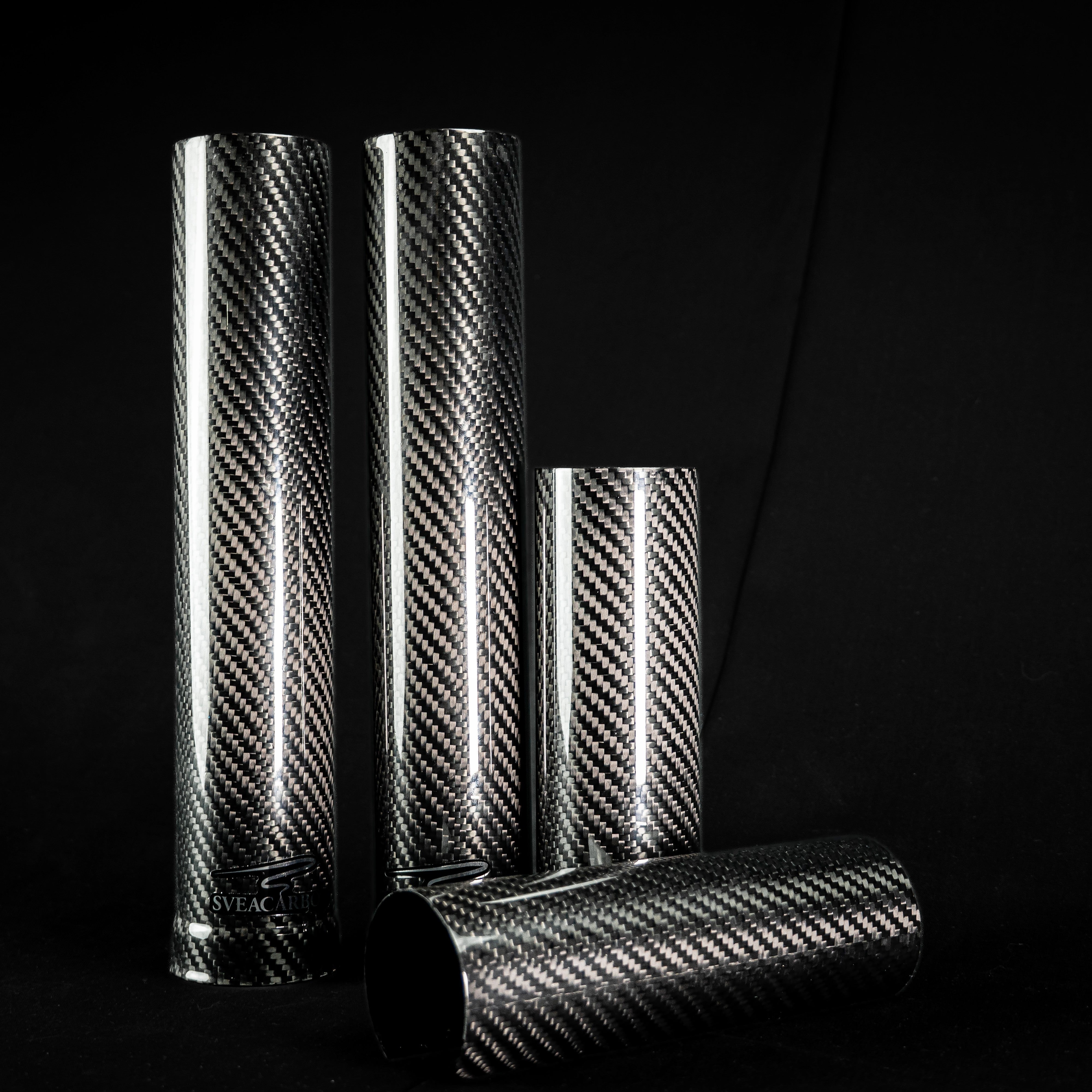 Full-length carbon fibre fork cover set with one tube showing the open end