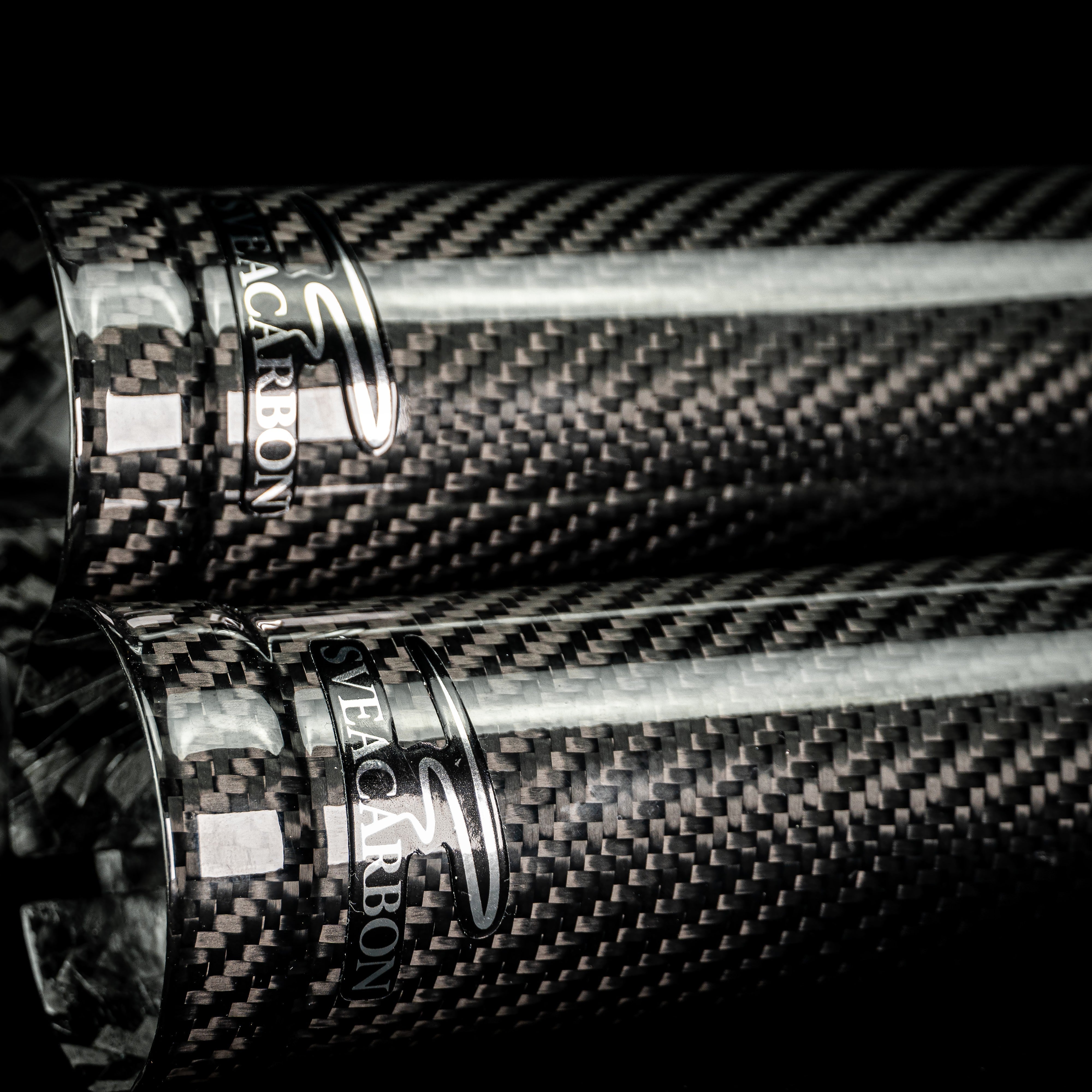 Full-length carbon fork cover ends with Sveacarbon logo caps